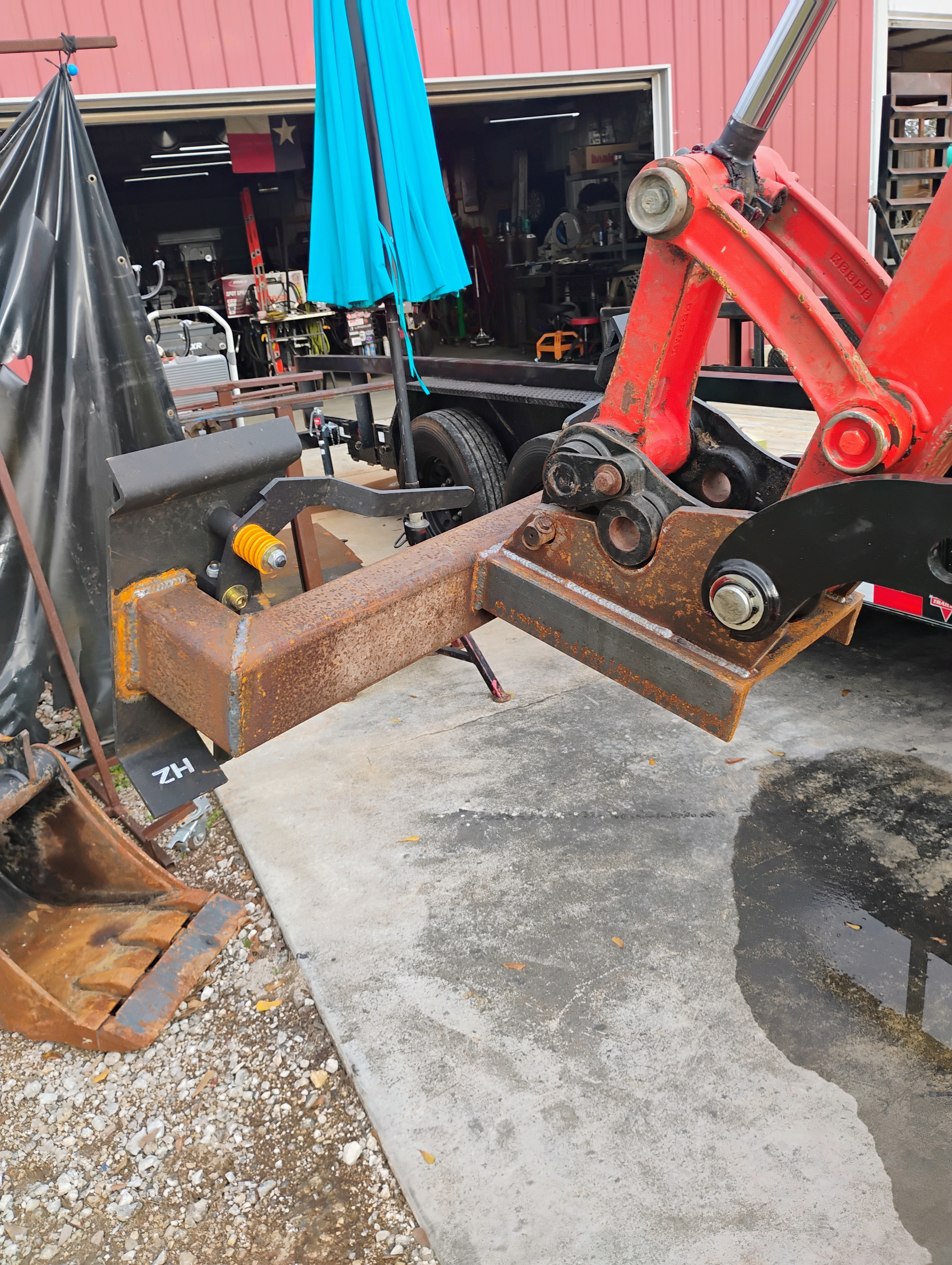 Raw steel frame mount for a custom excavator brush cutter attachment