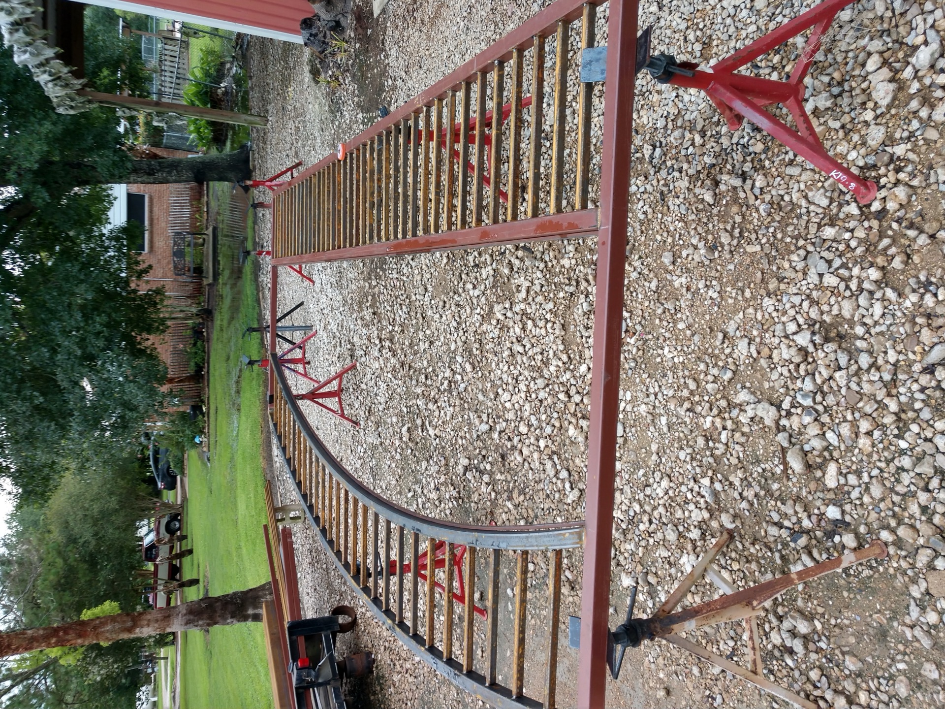 Arched fence panel under construction