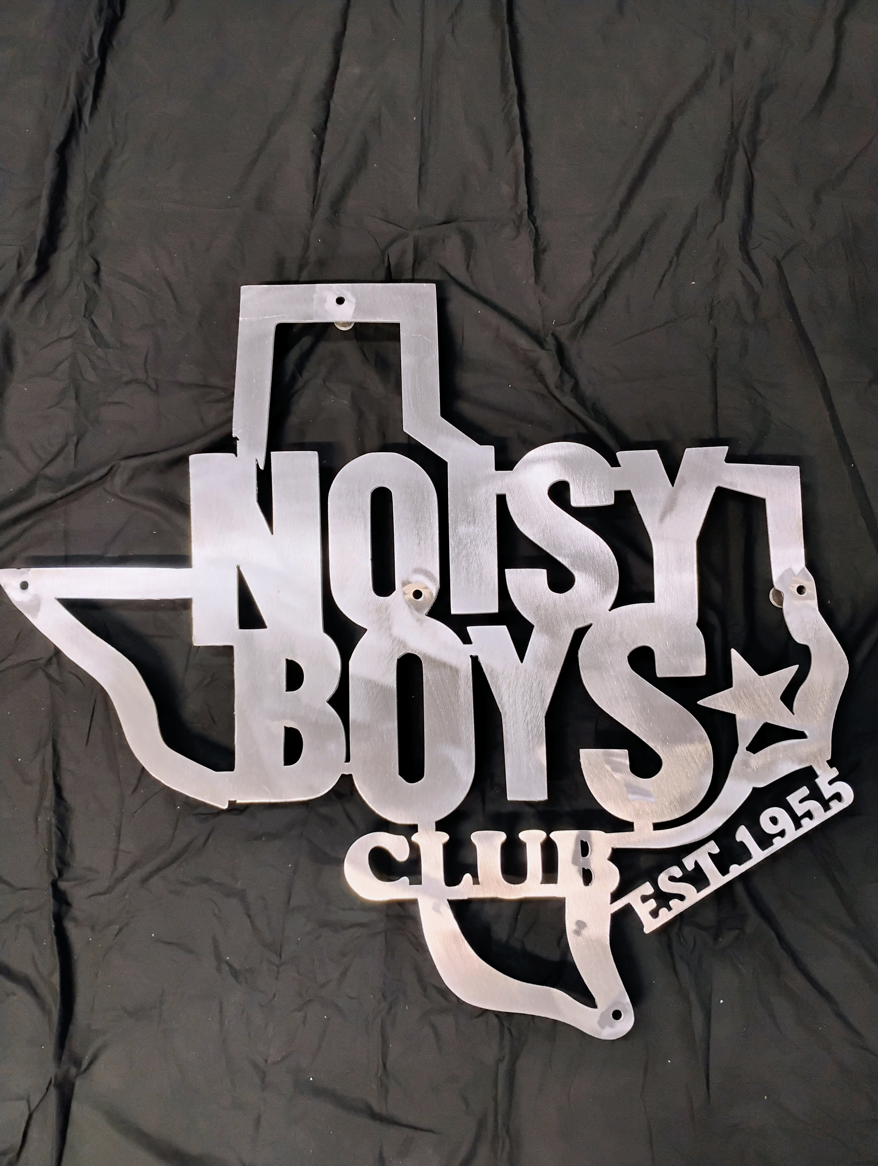 4C monogram custom metal sign close up