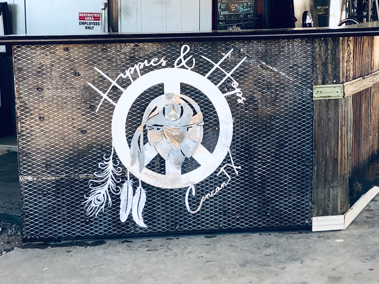 Hippies and Hops bar front sign