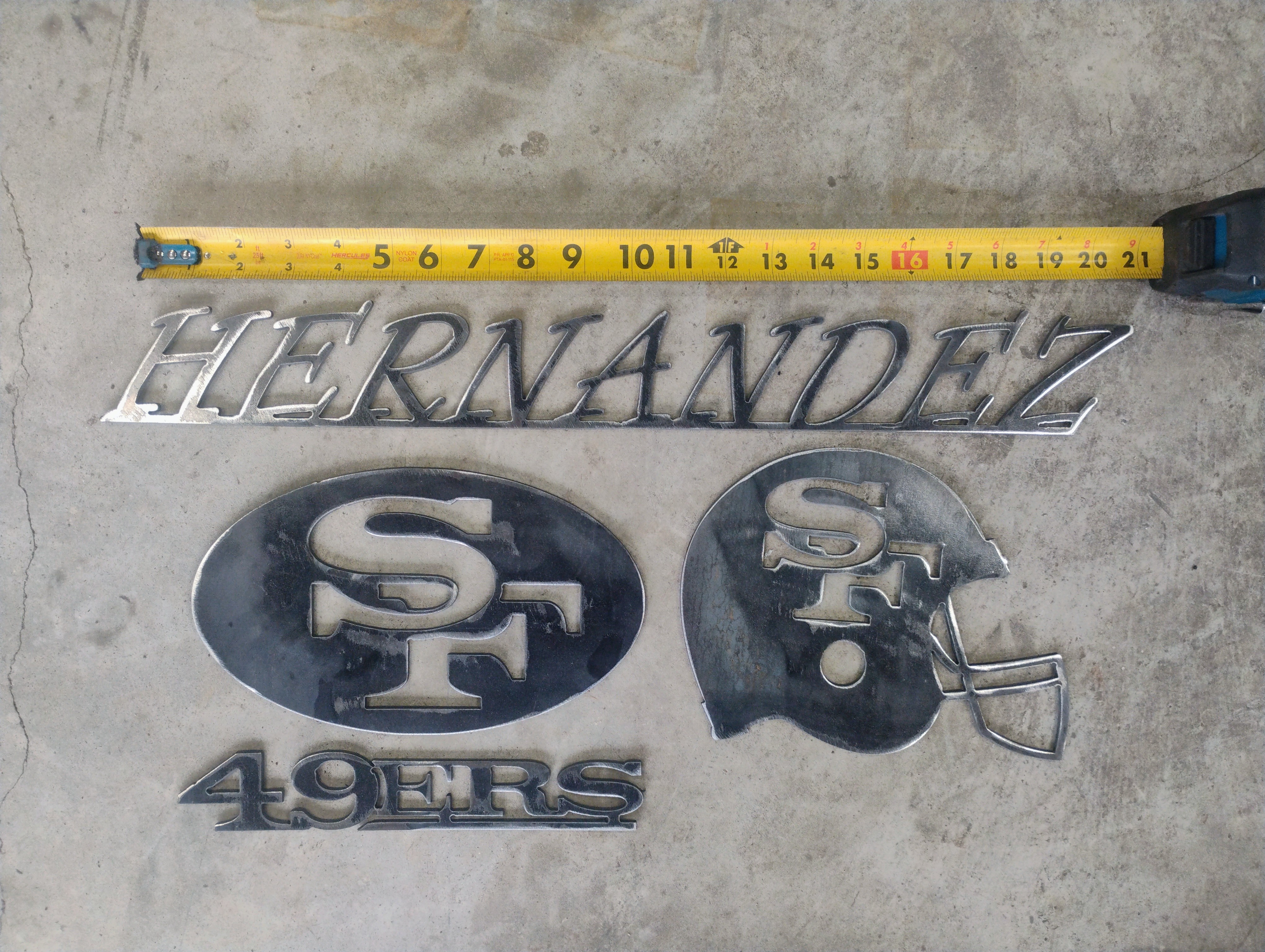 Custom Hernandez and 49ers themed metal sign set