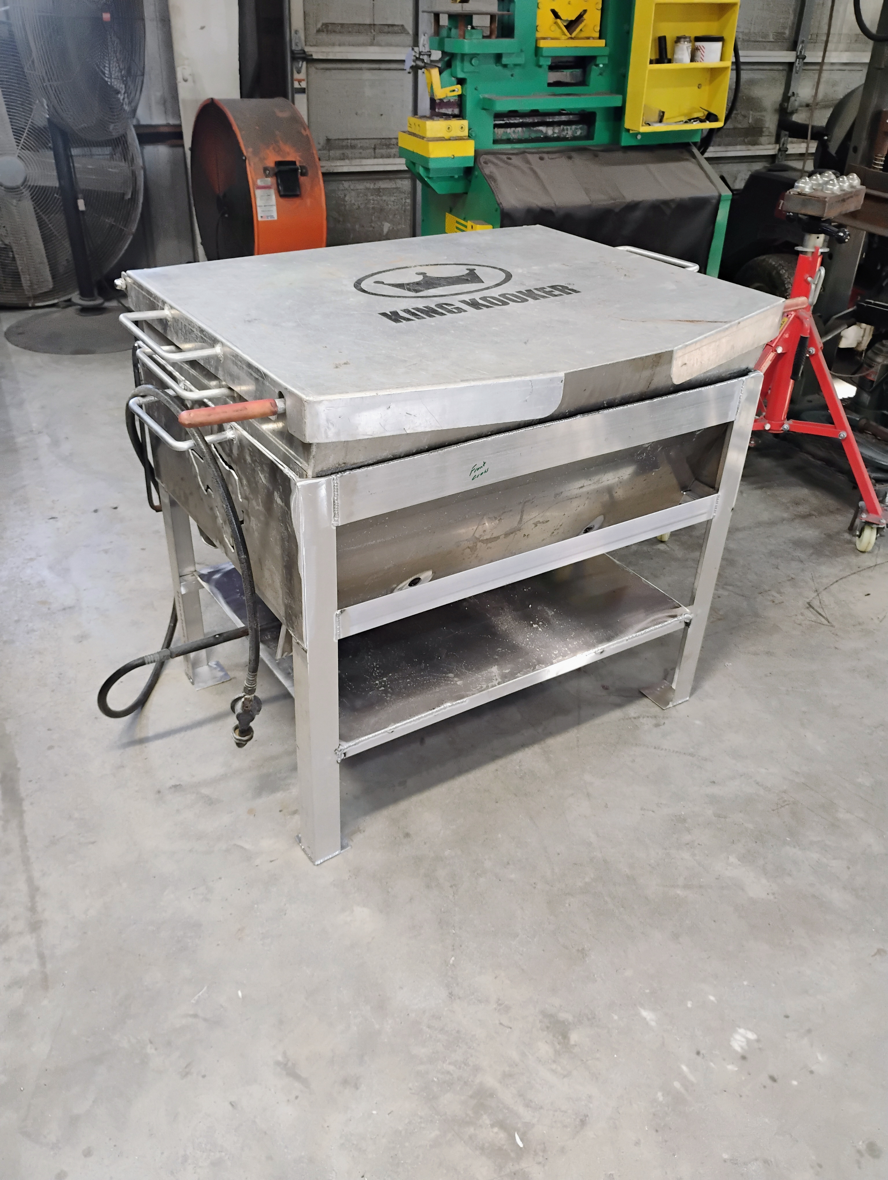 Custom stainless cooker with King Kooker logo viewed from the front angle